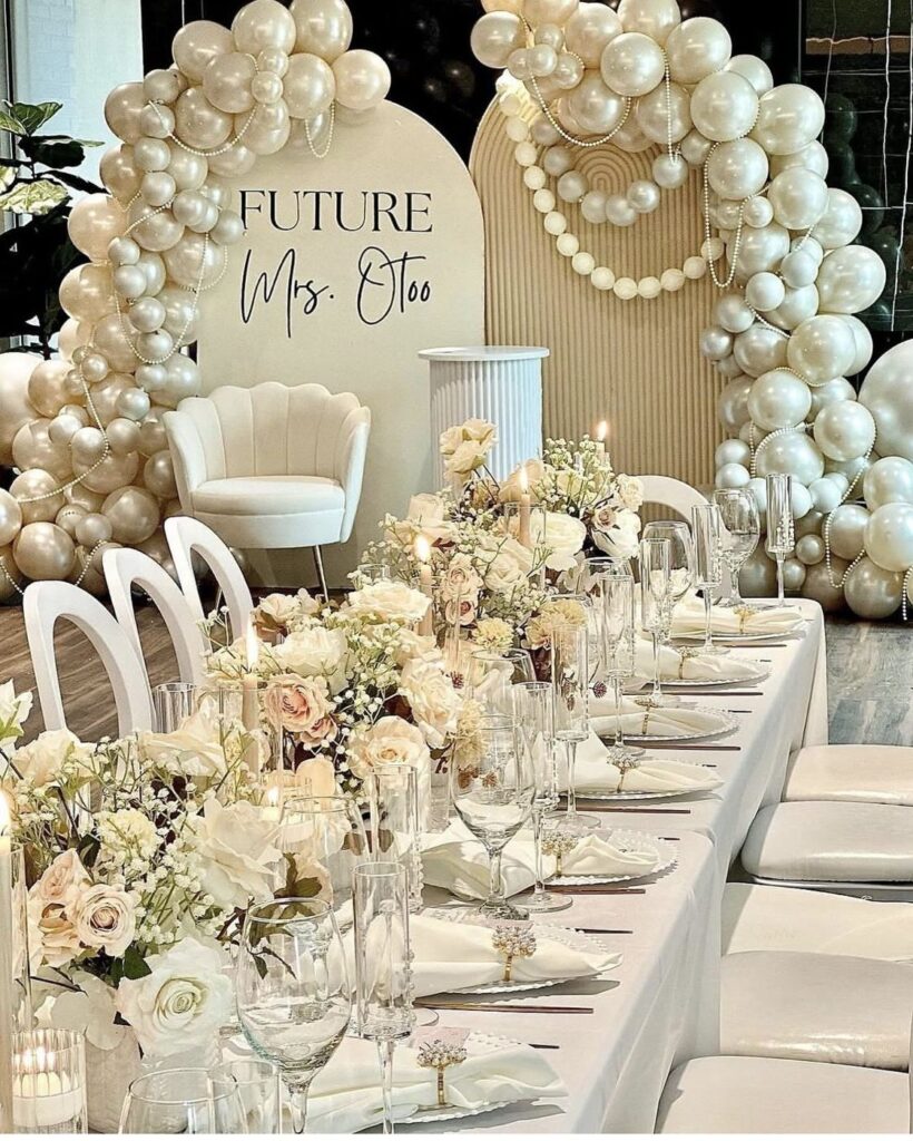 Pearl balloon bridal shower backdrop and tablescape by Fems Events